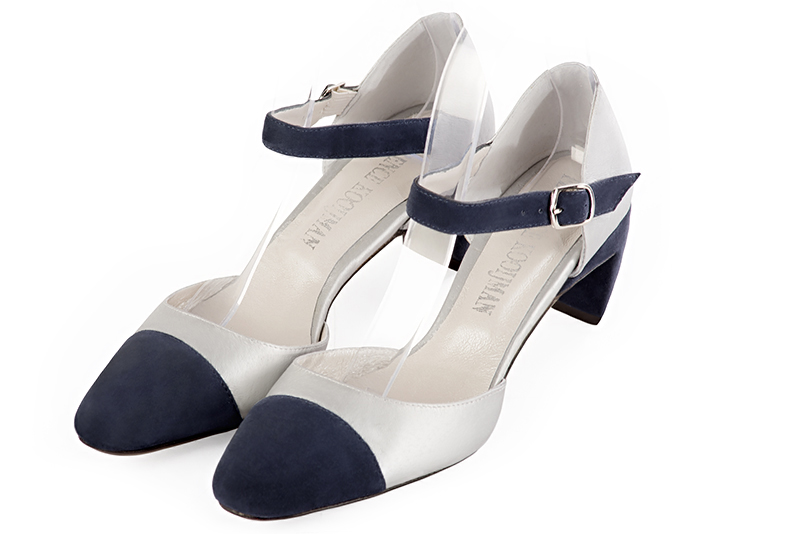 Navy blue and light silver women's open side shoes, with an instep strap. Round toe. Medium comma heels. Front view - Florence KOOIJMAN